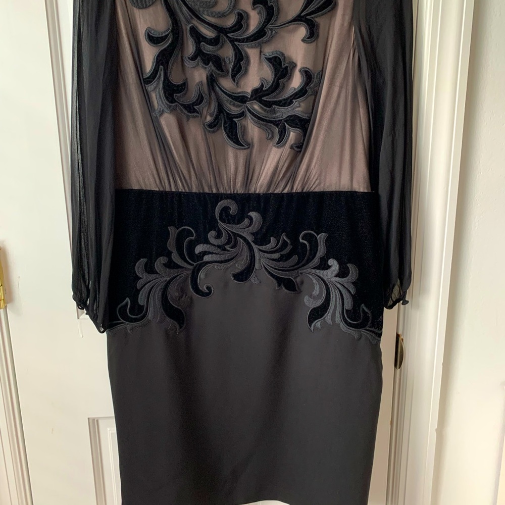 Beautiful dress with a lot details on the front.